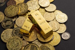 Złote sztabki i monety